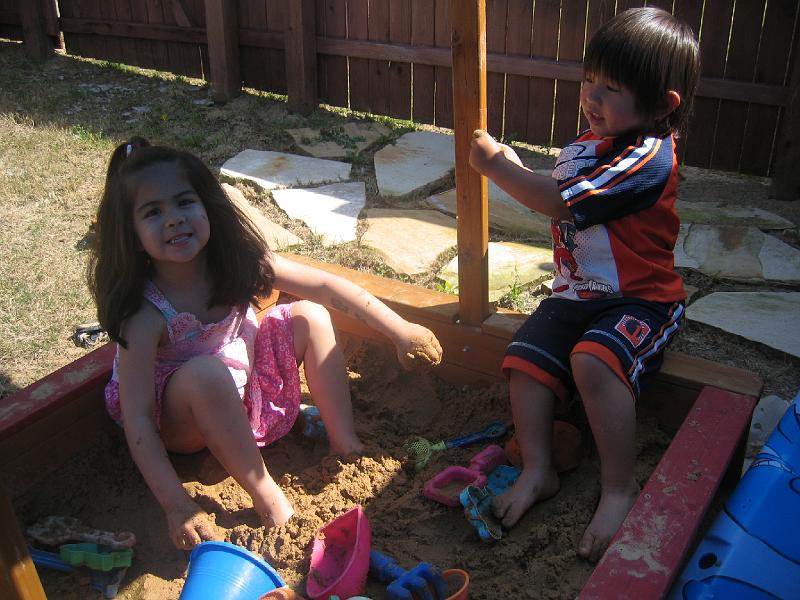 April6SandBox.jpg - Maya and Lukas playing in the sandbox - April 6